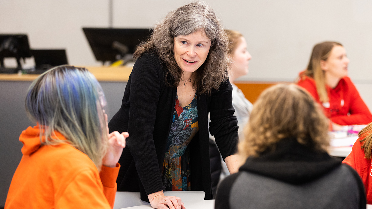 coaches local Science Olympiad team, highlights decadelong